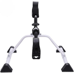 Portable pedal exerciser for home fitness, sturdy metal frame and black foot straps