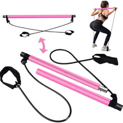 Pink AuraFit portable Pilates studio kit with black handles and connectors, shown with a person using it.